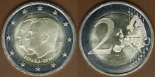 Двухевровая монета с профилями и картой Европы